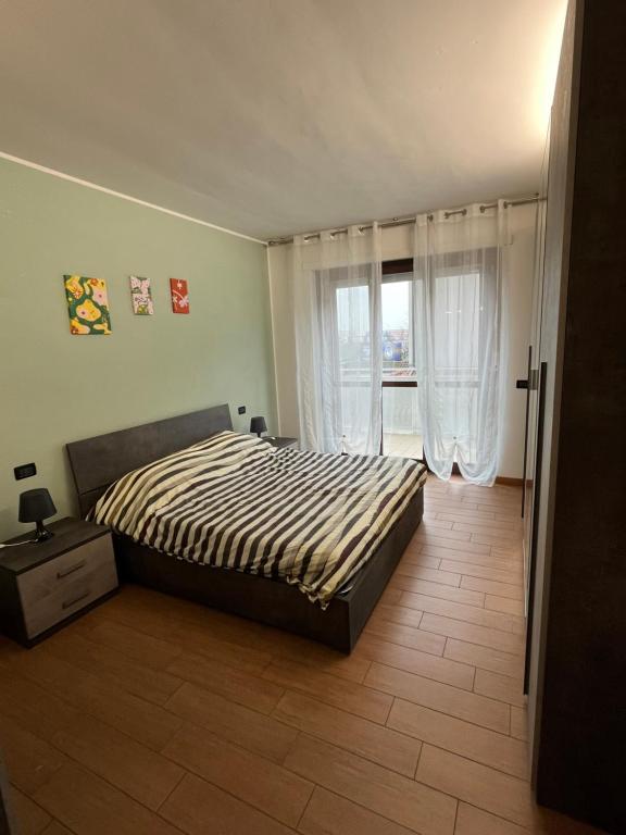 Postel nebo postele na pokoji v ubytování Casa Laetitia