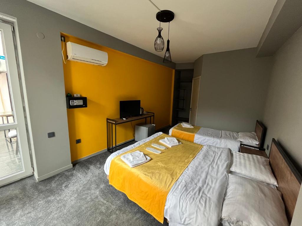 Postel nebo postele na pokoji v ubytování Diuma Hotel