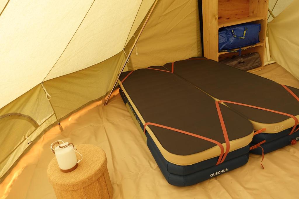 Postel nebo postele na pokoji v ubytování Camping Houtum
