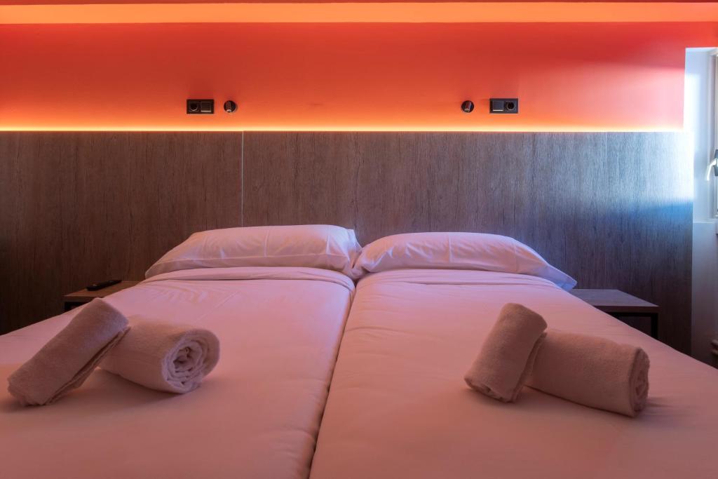 Postel nebo postele na pokoji v ubytování Pic Maià Mountain Hotel