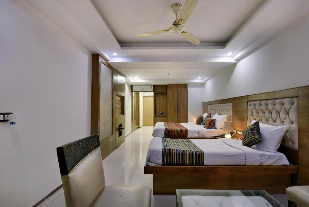 Letto o letti in una camera di Hotel Lotus Paradise - Front of Parker Mall