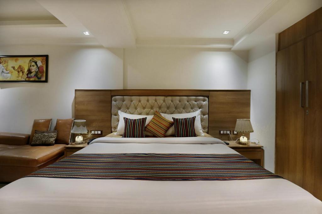 Letto o letti in una camera di Hotel Lotus Paradise - Front of Parker Mall