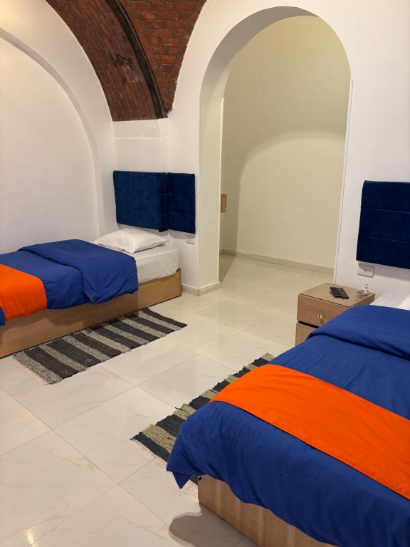 Postel nebo postele na pokoji v ubytování JAREEDY Guest house