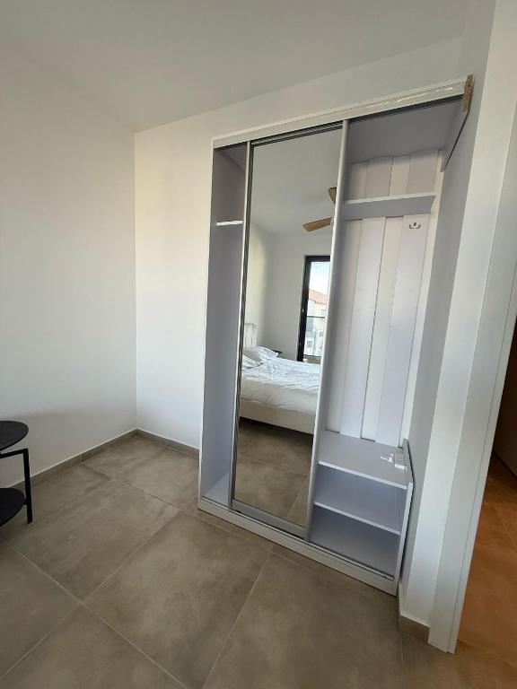 Postel nebo postele na pokoji v ubytování J&G Suites