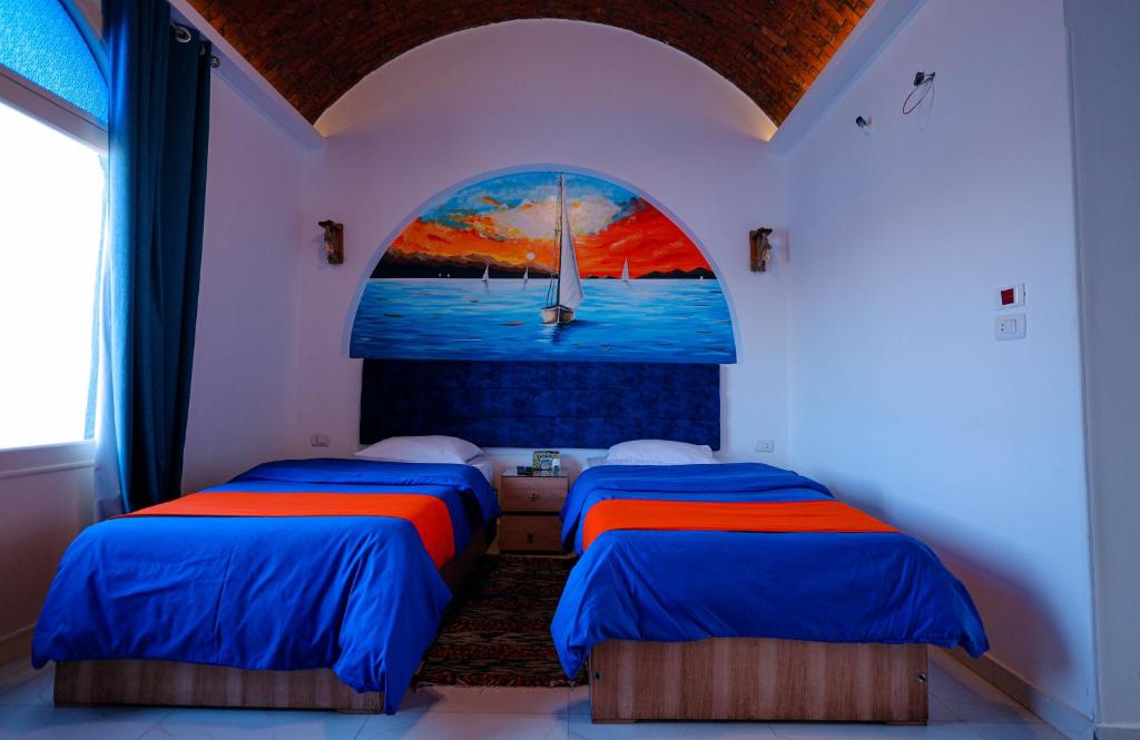 Postel nebo postele na pokoji v ubytování JAREEDY Guest house