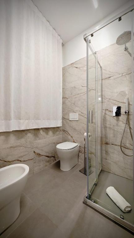 Koupelna v ubytování Giuliani Rooms