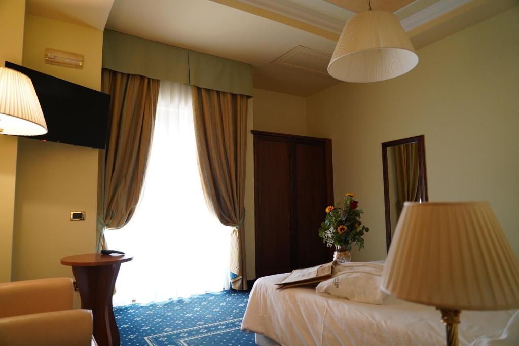 TV a/nebo společenská místnost v ubytování Hotel Lemi