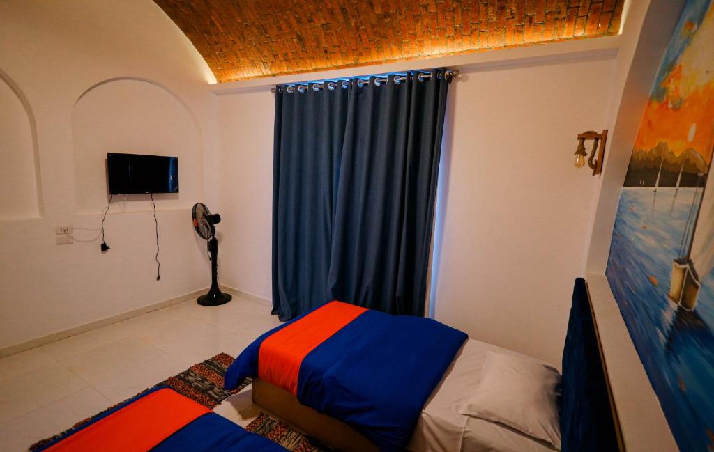 Postel nebo postele na pokoji v ubytování JAREEDY Guest house