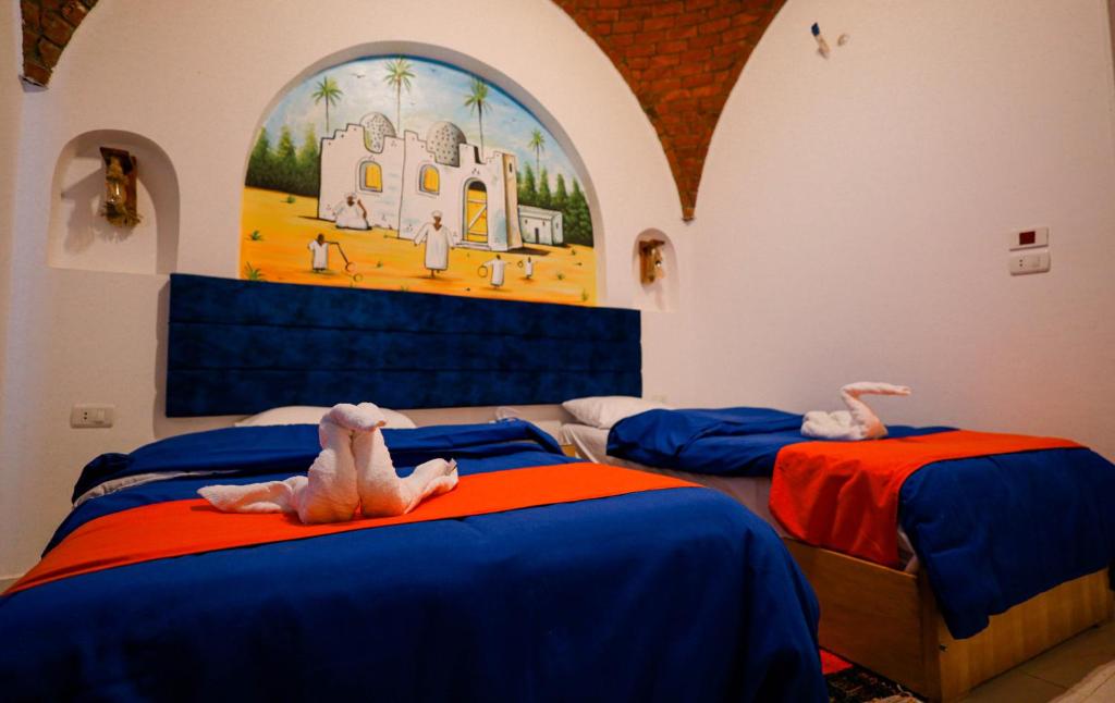Postel nebo postele na pokoji v ubytování JAREEDY Guest house