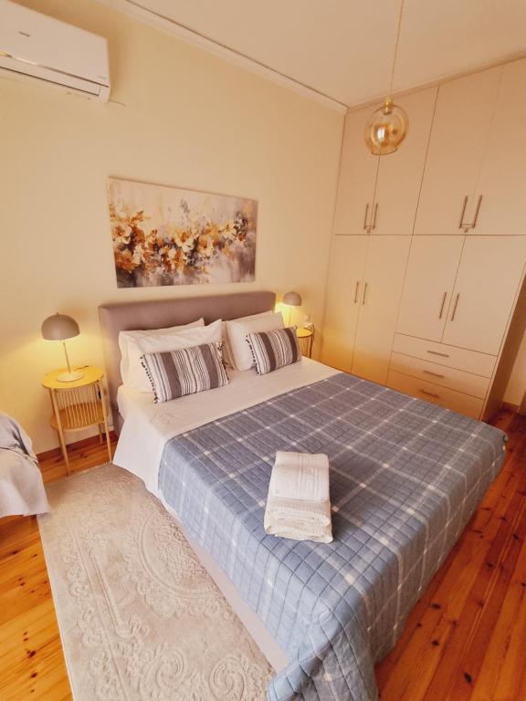 Postel nebo postele na pokoji v ubytování City Life Apartment