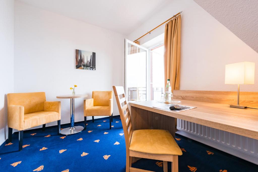 Posezení v ubytování Hotel Boddenhus Garni