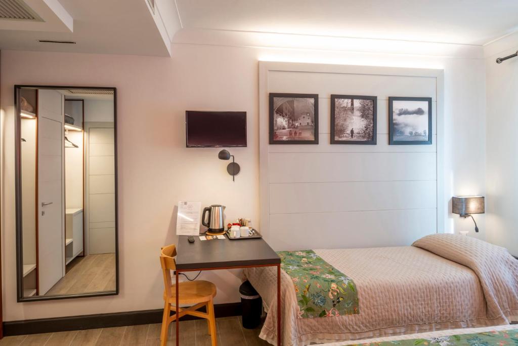 Postel nebo postele na pokoji v ubytování Duccio Nacci Rooms- Guesthouse