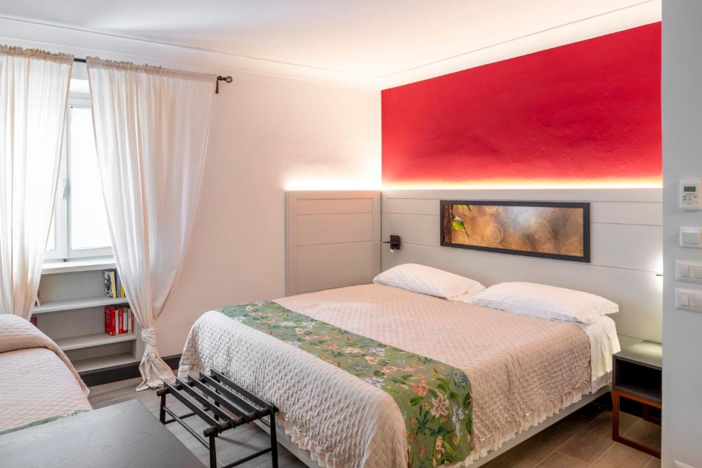 Postel nebo postele na pokoji v ubytování Duccio Nacci Rooms- Guesthouse