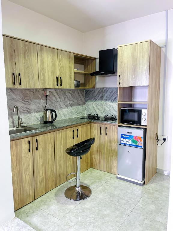 Kuchyň nebo kuchyňský kout v ubytování Spiffy Corner