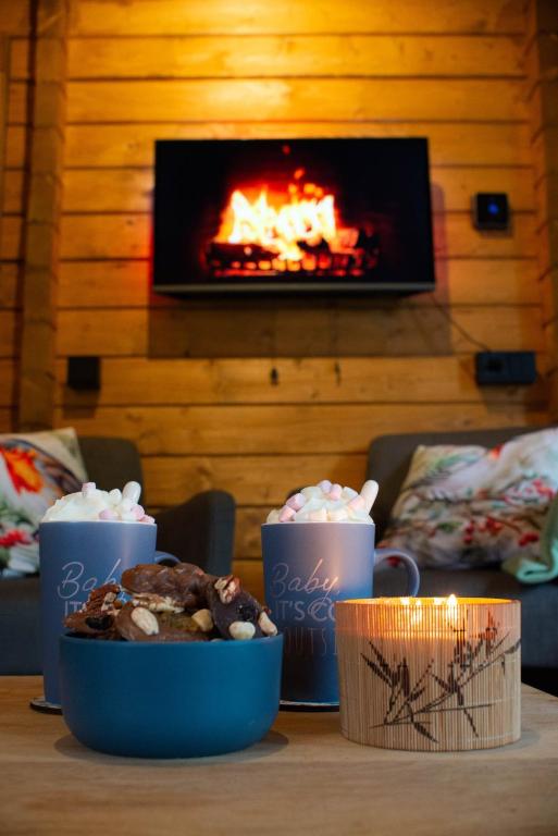 Posezení v ubytování Charmant, gezellig en knus 5p chalet op Veluwe naast Sauna Drome