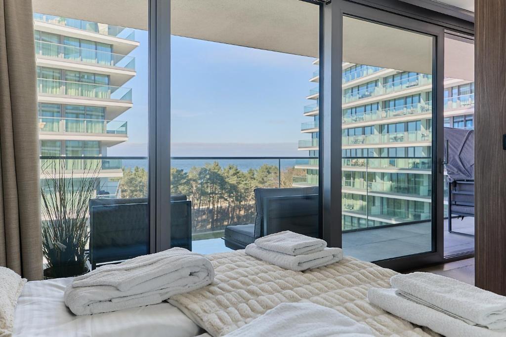 Postel nebo postele na pokoji v ubytování Wave - Beach Style Studio & Sea View