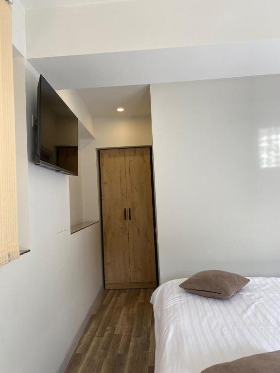 Postel nebo postele na pokoji v ubytování Taniqinn Dilijan Hotel