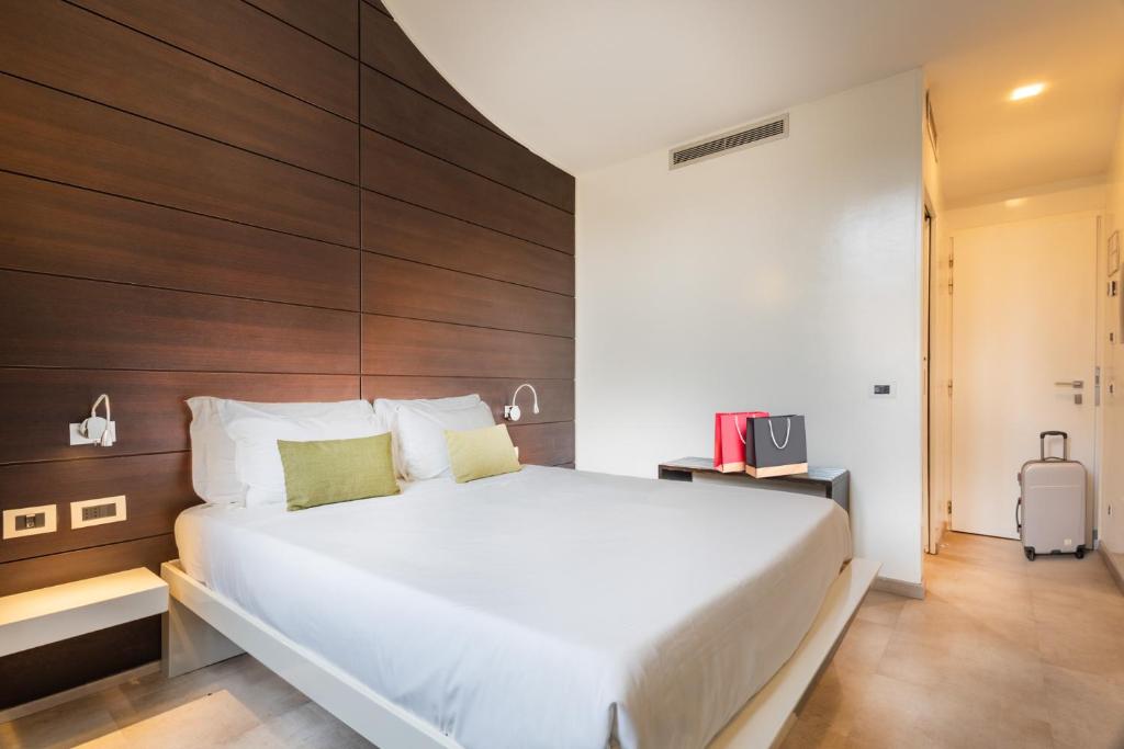 Postel nebo postele na pokoji v ubytování Navona Stay