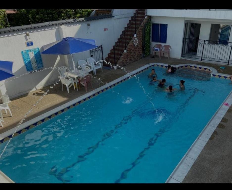 Bazén v ubytování Hotel Los Delfines Melgar nebo v jeho okolí