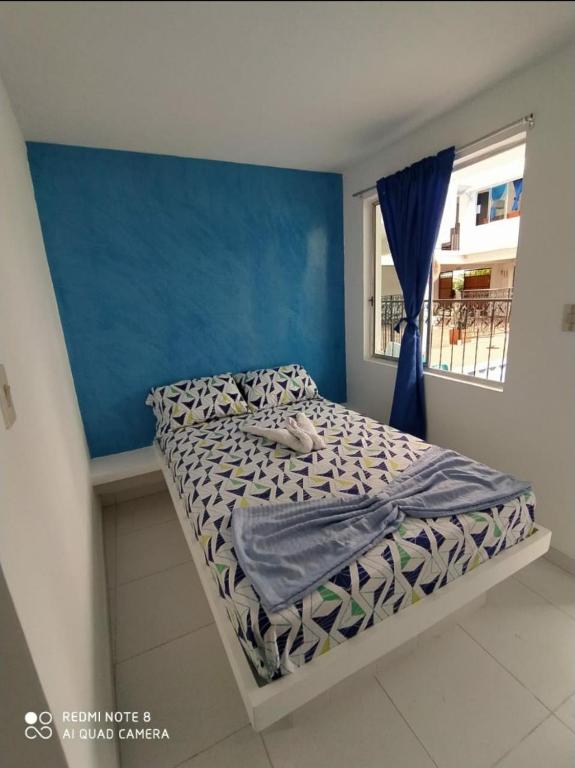 Postel nebo postele na pokoji v ubytování Hotel Los Delfines Melgar