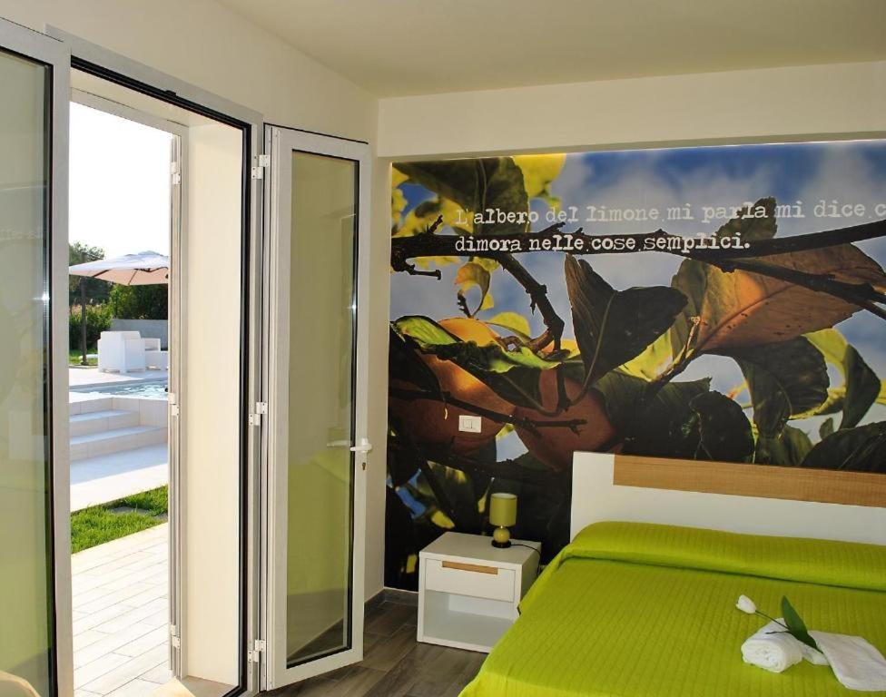 Postel nebo postele na pokoji v ubytování La Giara Guest House