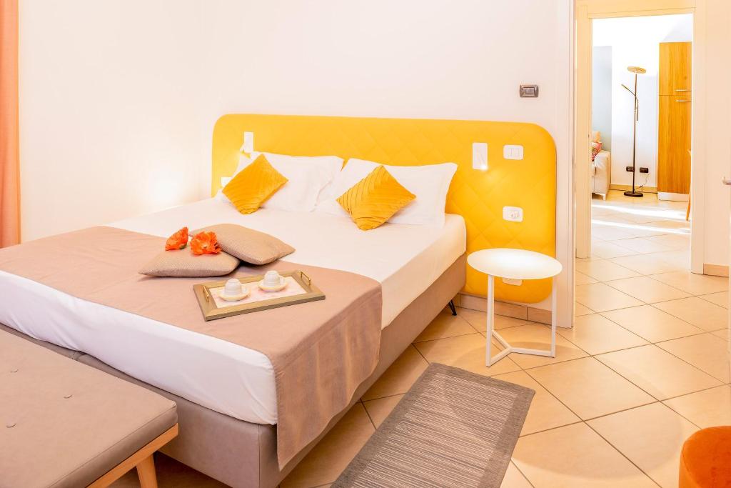 Postel nebo postele na pokoji v ubytování Hotel Taormina