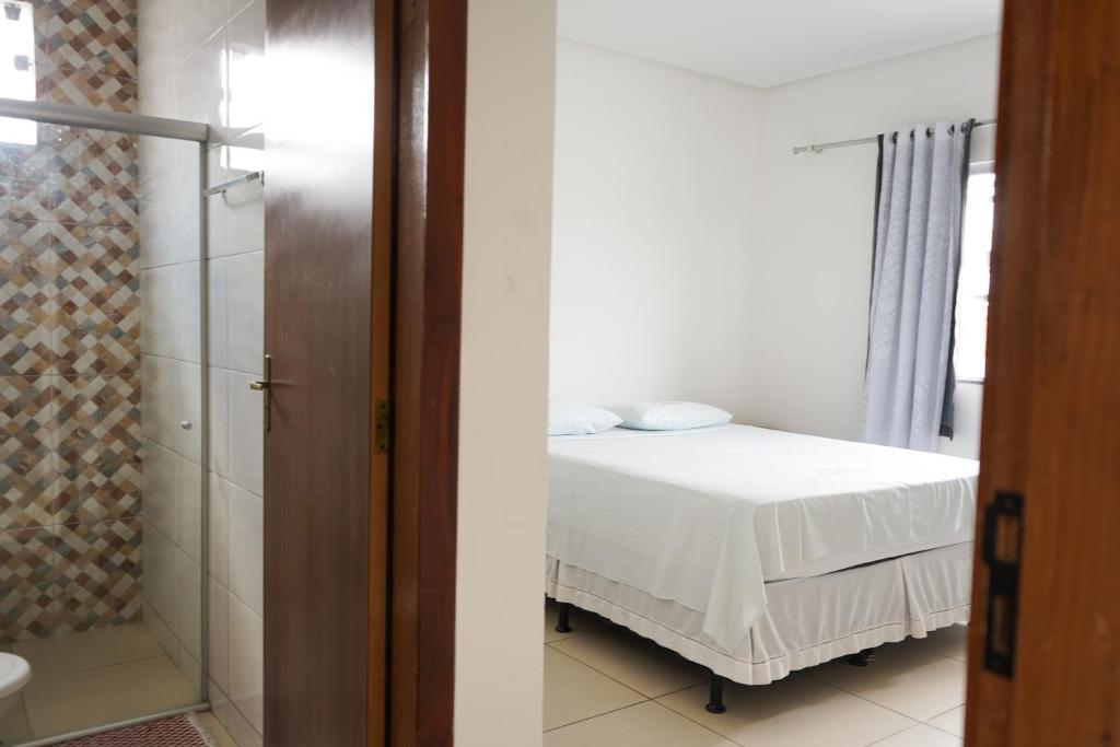 Postel nebo postele na pokoji v ubytování Hotel Galícia