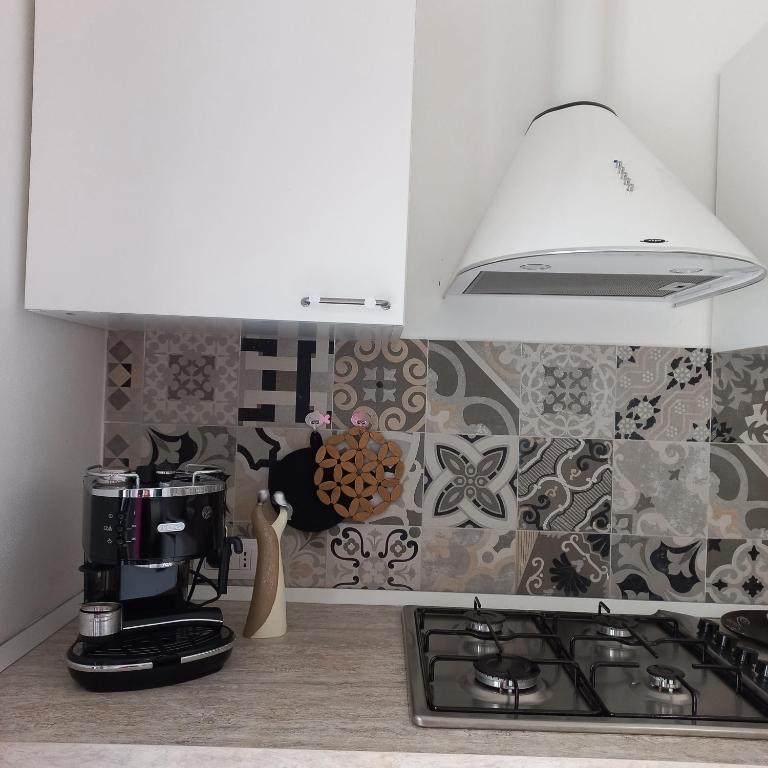 Kuchyň nebo kuchyňský kout v ubytování WindwoW - Your flat in Baunei