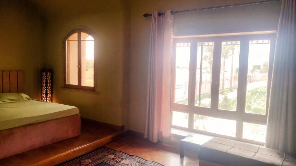 Postel nebo postele na pokoji v ubytování Alf Layla Resort