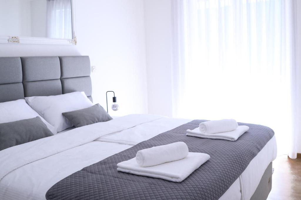 Postel nebo postele na pokoji v ubytování Artena Hotel