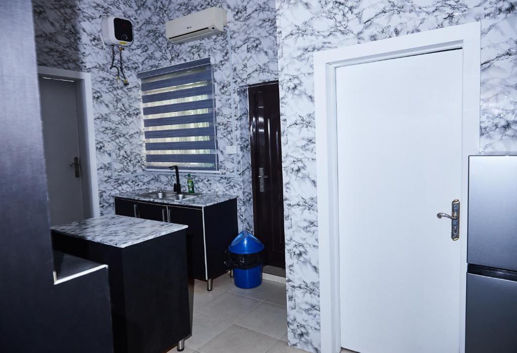 Kuchyň nebo kuchyňský kout v ubytování Tee-whyte private home