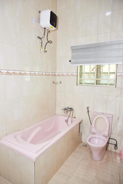 Koupelna v ubytování Tee-whyte private home
