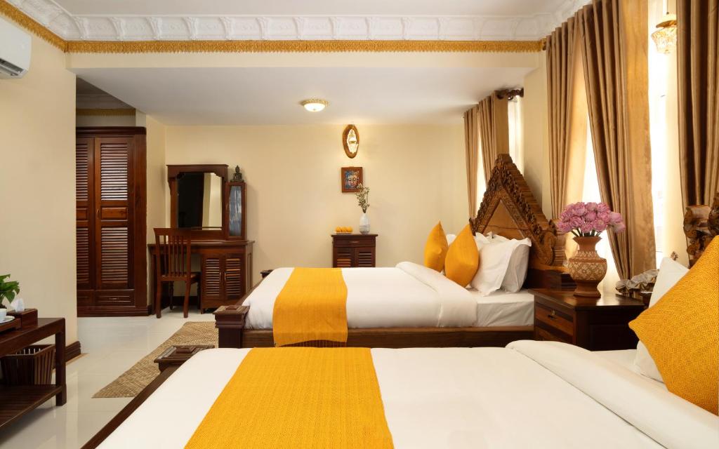 Postel nebo postele na pokoji v ubytování Bronam Residence & Spa