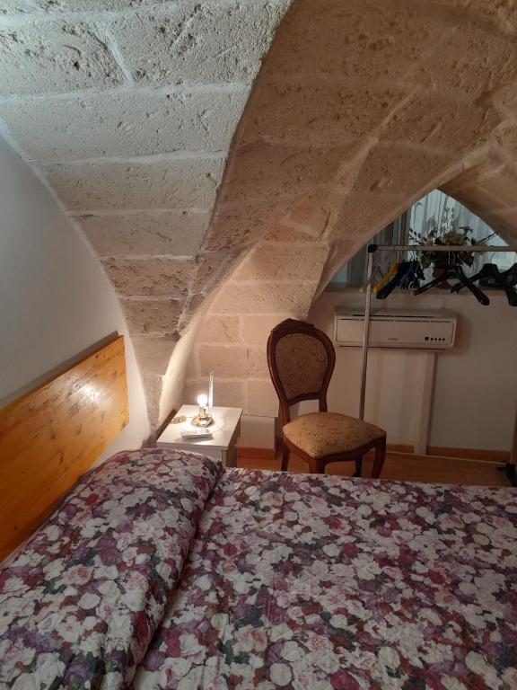 Postel nebo postele na pokoji v ubytování Dafne B&B
