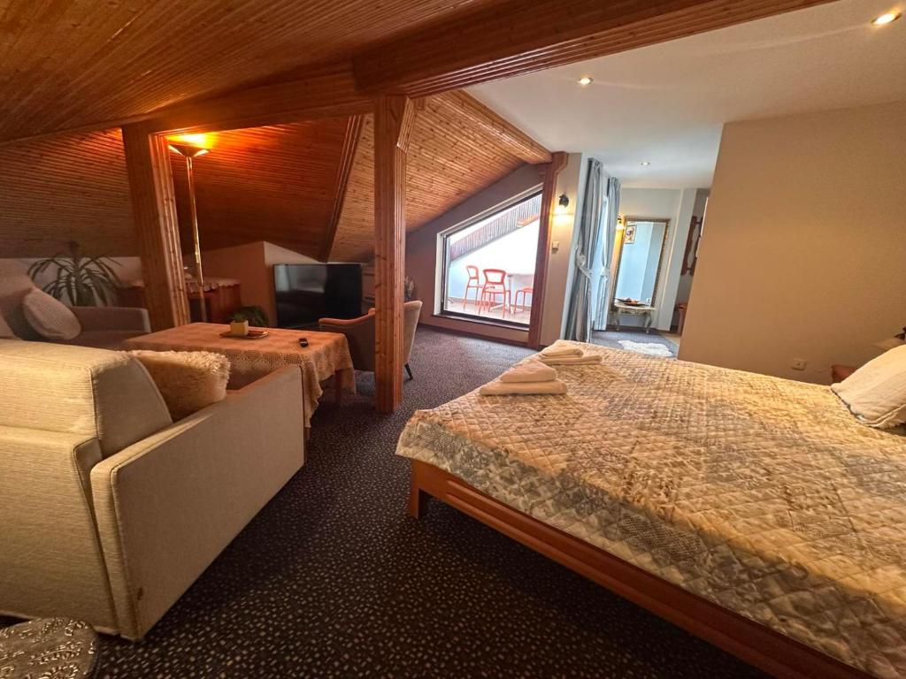 Postel nebo postele na pokoji v ubytování Boutique Hotel St. Stefan