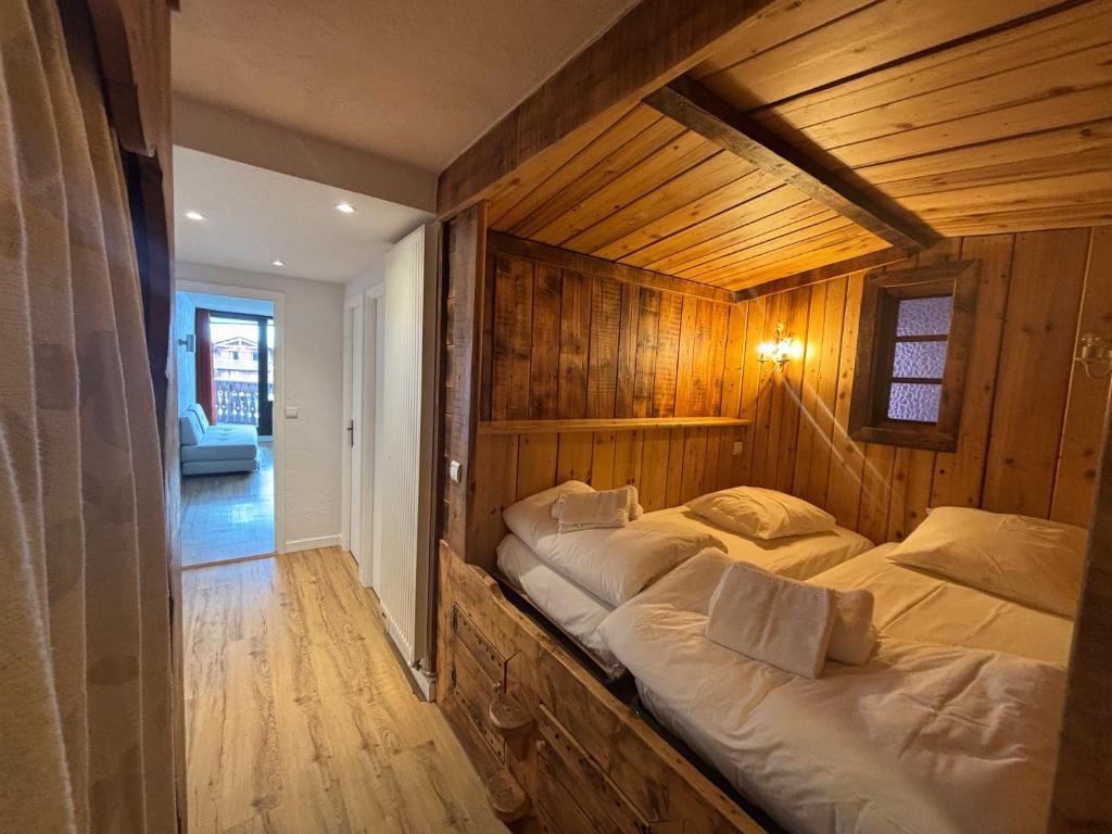 Postel nebo postele na pokoji v ubytování Résidence Le Portillo