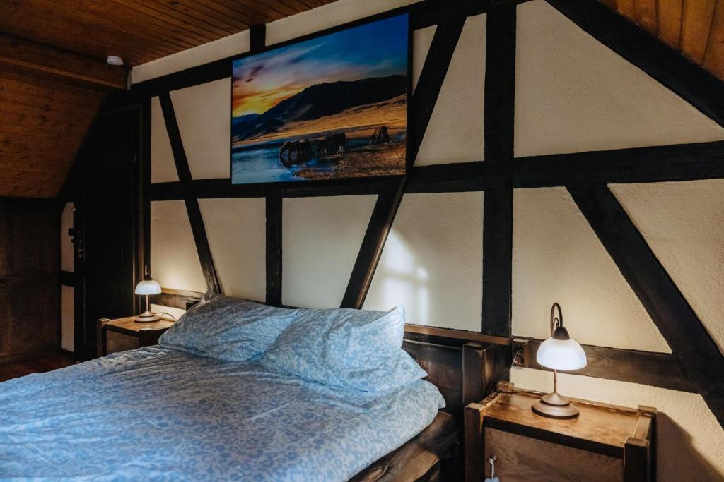 Postel nebo postele na pokoji v ubytování Außerhalb2 - Gästehaus Mühlstein
