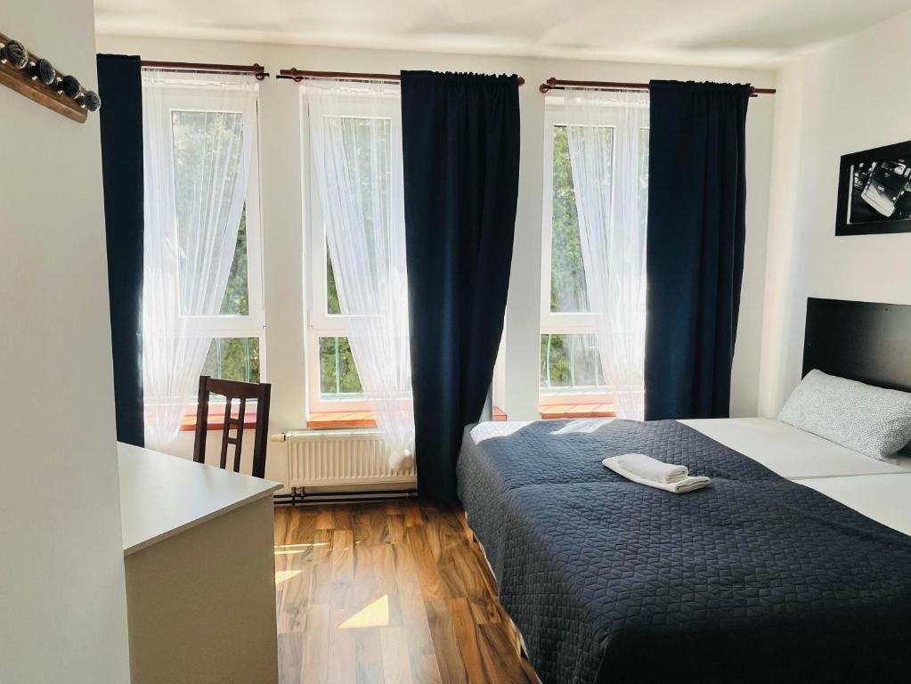 Postel nebo postele na pokoji v ubytování Art HOTEL