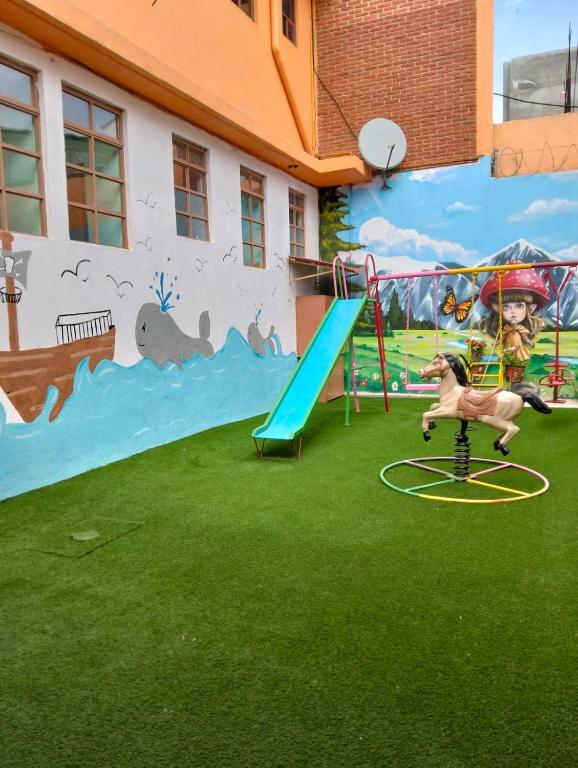 Herní místnost nebo prostor pro děti v ubytování Hotel Tres Flores