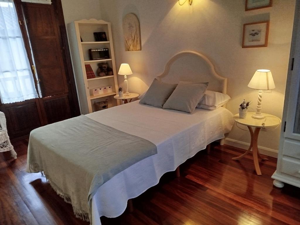 Posteľ alebo postele v izbe v ubytovaní Cabárceno Chalet vacacional Casa Pedro La Abadilla
