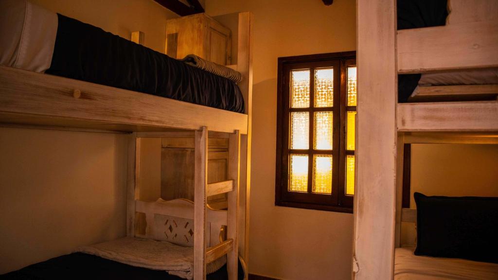 Postel nebo postele na pokoji v ubytování Usaquen Station Hostel