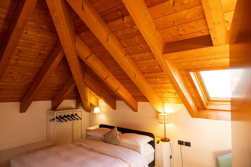 Postel nebo postele na pokoji v ubytování Bernina Express Eco Rooms&Breakfast