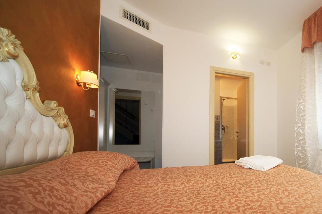 Posteľ alebo postele v izbe v ubytovaní B&B Rialto Dream