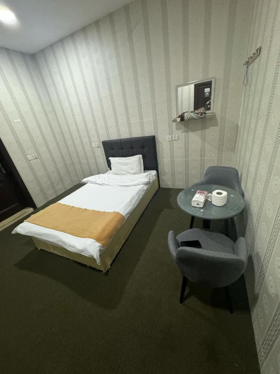 Letto o letti in una camera di Rayan Residence