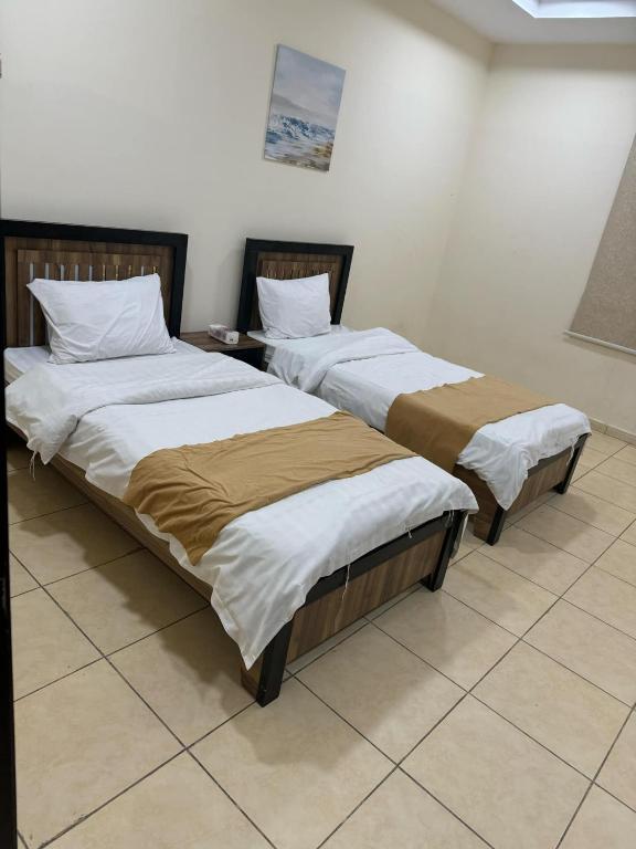 Letto o letti in una camera di Rayan Residence