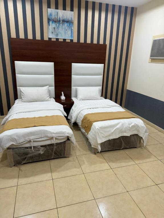 Letto o letti in una camera di Rayan Residence