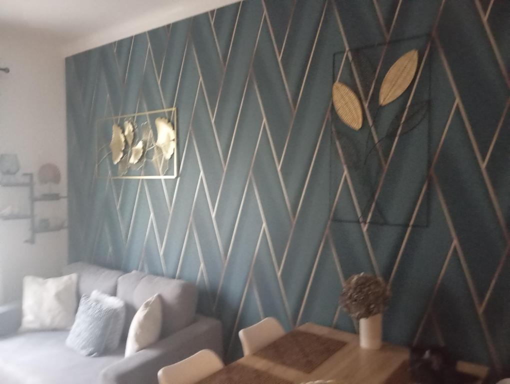 Posezení v ubytování Appartement hyper centre 1 lorient Jardin clos