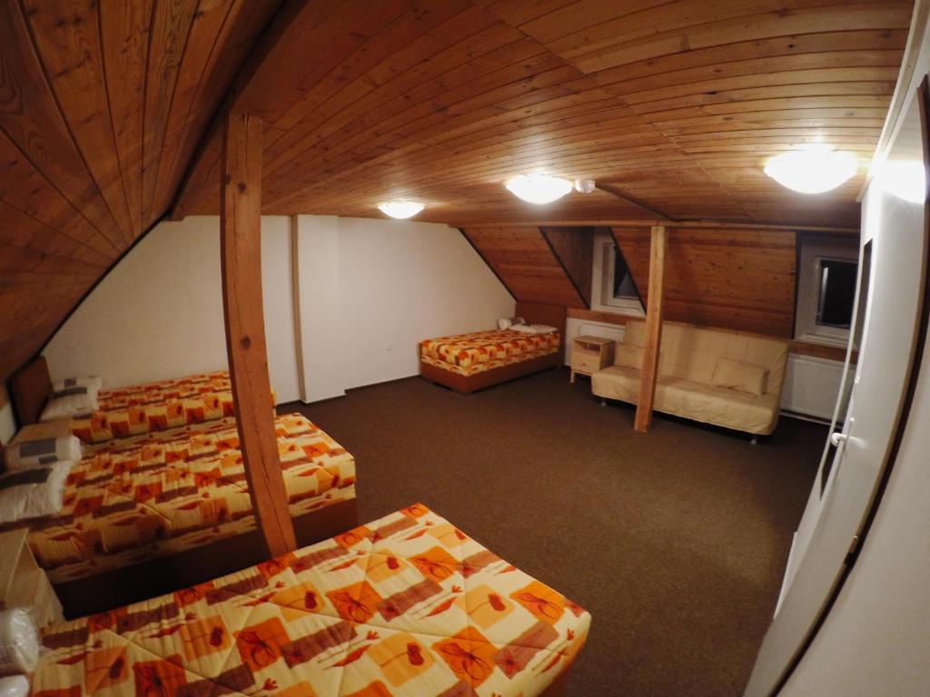 Postel nebo postele na pokoji v ubytování Hotel & Restaurant Adolfovský Dvůr