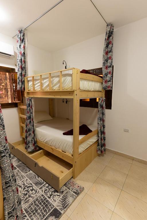 Postel nebo postele na pokoji v ubytování Wanas hostel
