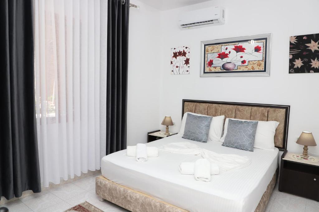 Postel nebo postele na pokoji v ubytování Guest House Marjo